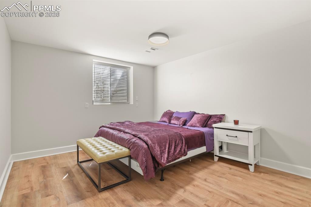 Image 37 of 48: Basement bedroom with closet and egress window
