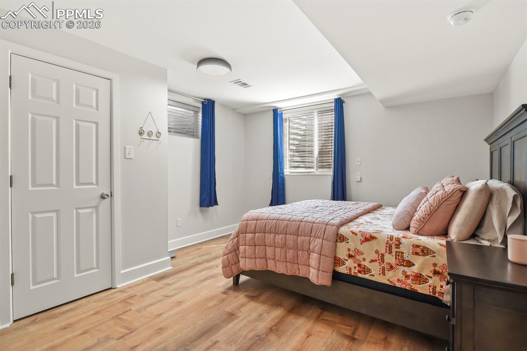 Image 40 of 48: Second basement bedroom with closet and egress window