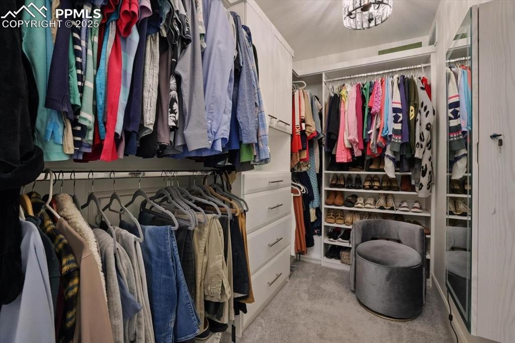 Image 23 of 42: Custom California Closet System