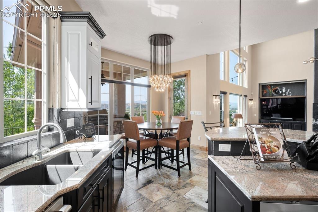 Image 15 of 47: Enjoy watching the light change throughout the day through the French-style