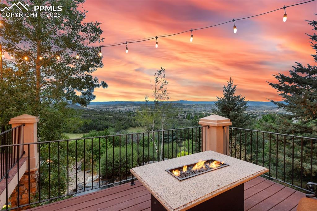 Image 18 of 47: Gather by one of the built in firepits to enjoy panoramic views of the moun