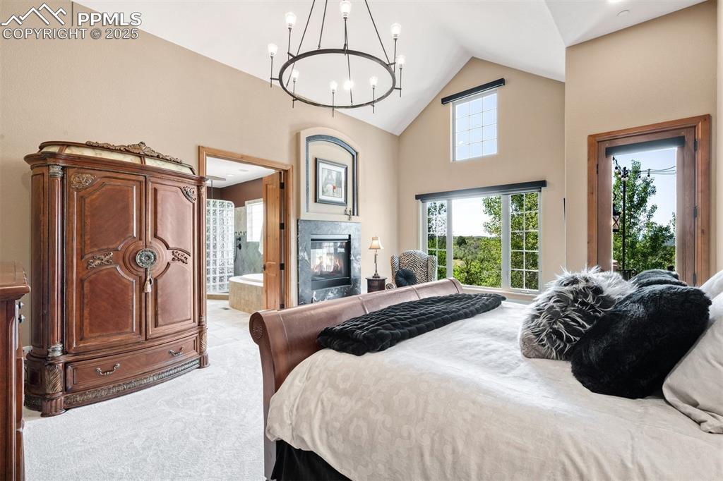 Image 19 of 47: From the primary en-suite, step out to a secluded terrace, perfect for taki