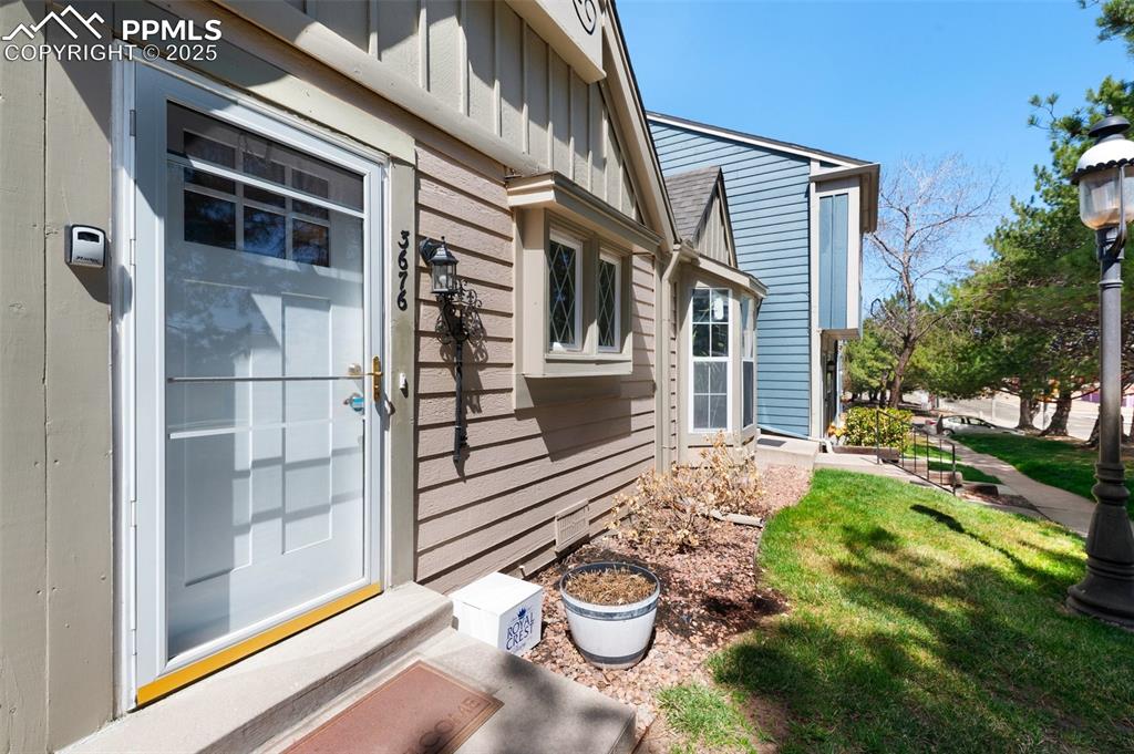 Image 3 of 26: Front door entrance to the unit.