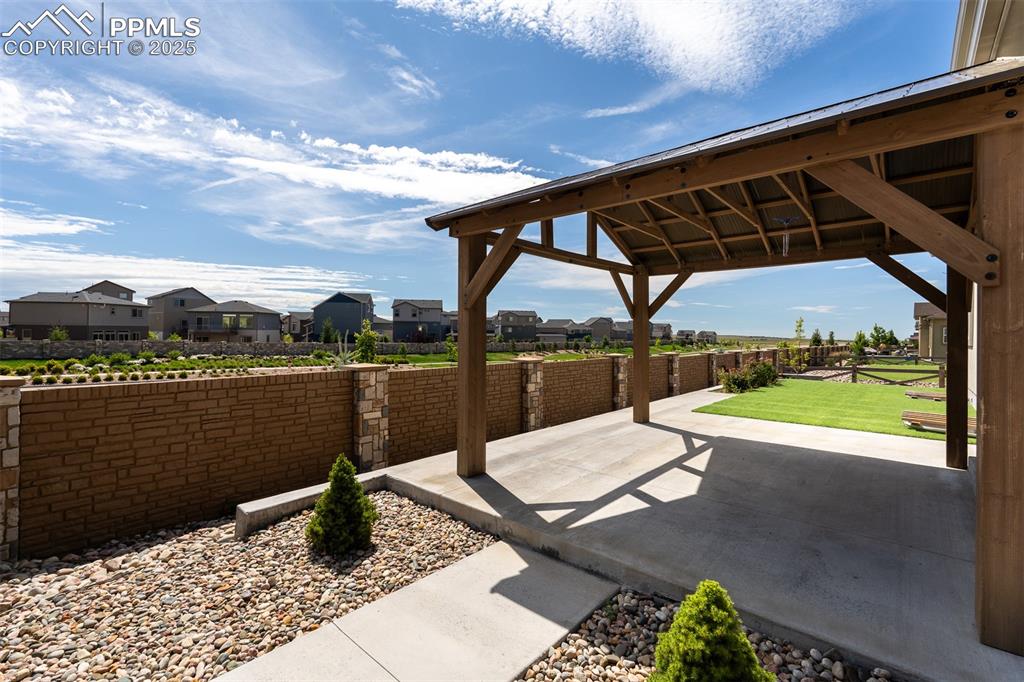 Image 11 of 46: View of patio featuring a residential view and a gazebo