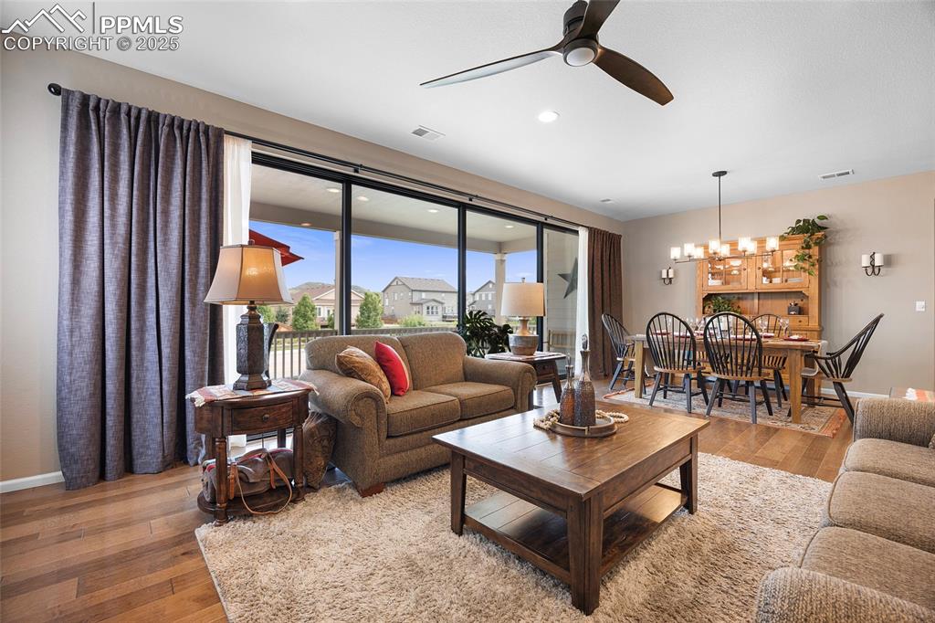 Image 13 of 48: 26 foot wall to wall sliding glass doors