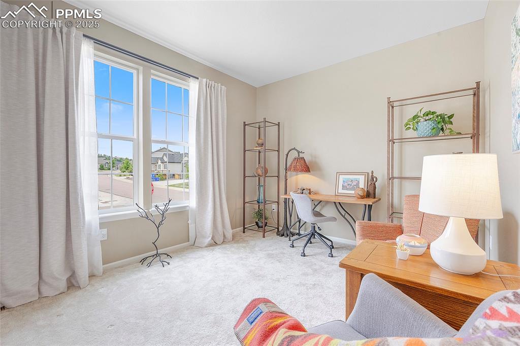 Image 23 of 48: Front bedroom, 2nd bedroom.