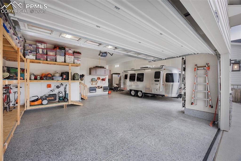 Image 45 of 48: 2 car plus Full size RV garage.