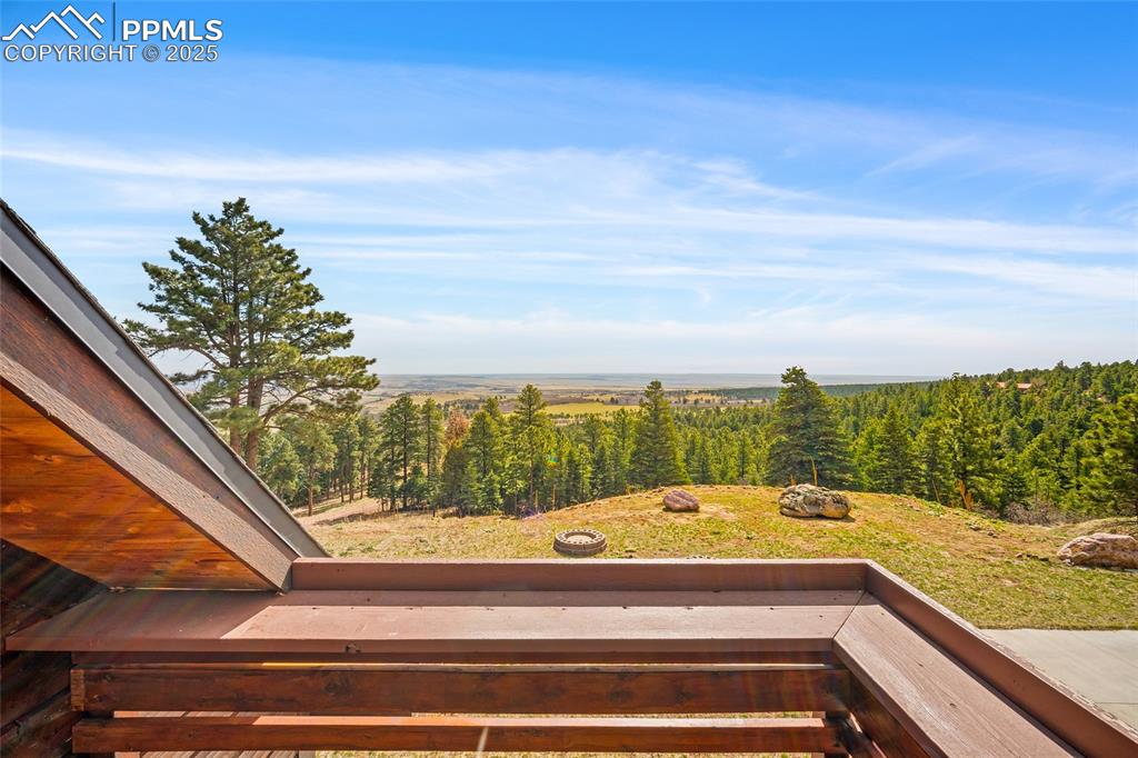 Image 33 of 50: Stunning countryside view from deck off of family room french door entry