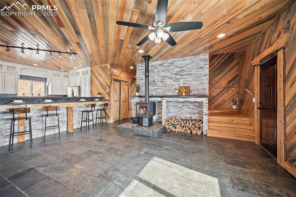 Image 6 of 50: View of living room from sunroom