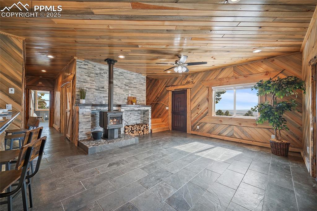 Image 8 of 50: View of living room featuring stunning views of the horizon
