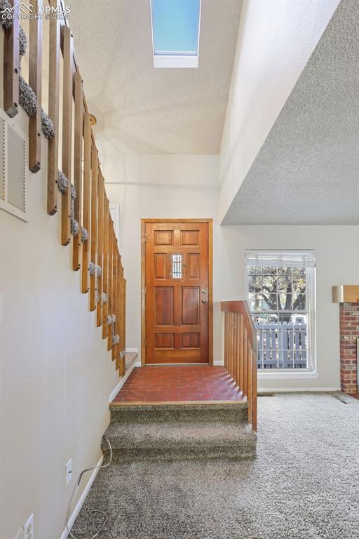 Image 15 of 39: Entry Way Sky Light!