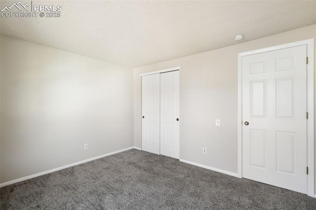 Image 23 of 39: Upstairs Secondary Bedroom!