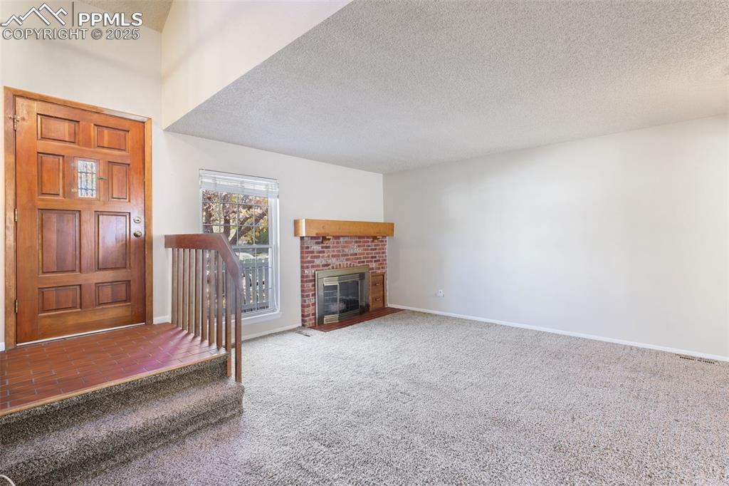 Image 3 of 39: Brick Floor Entry Way!