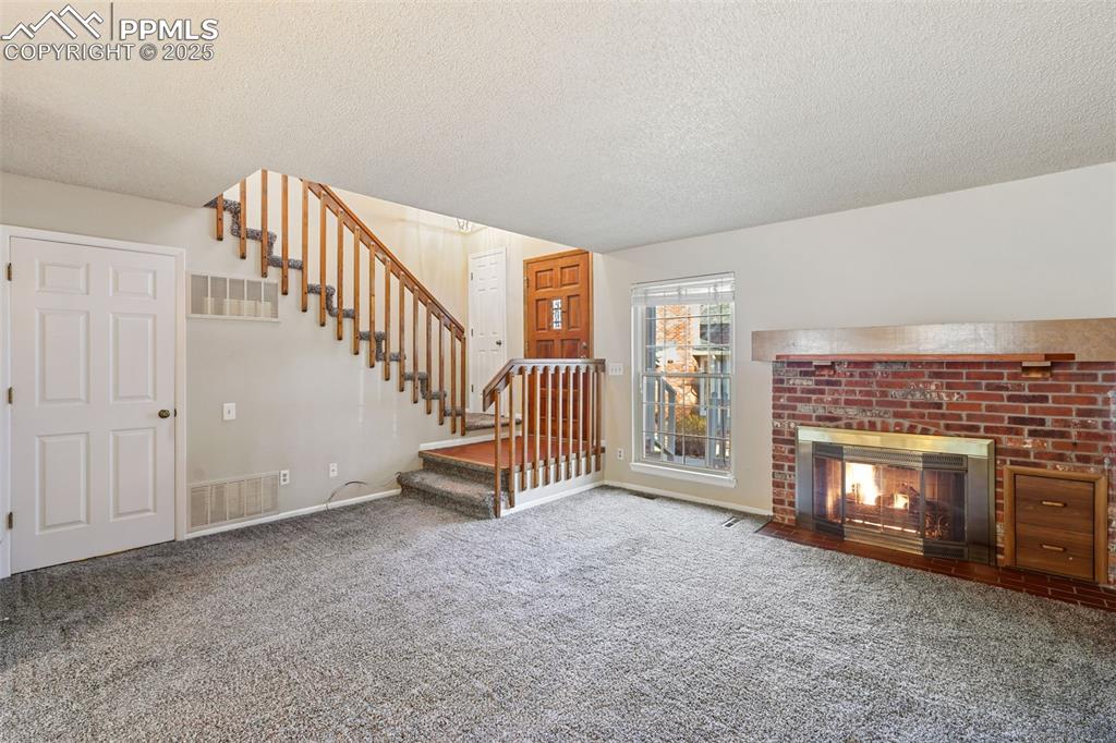 Image 5 of 39: Cozy, Gas Fireplace!