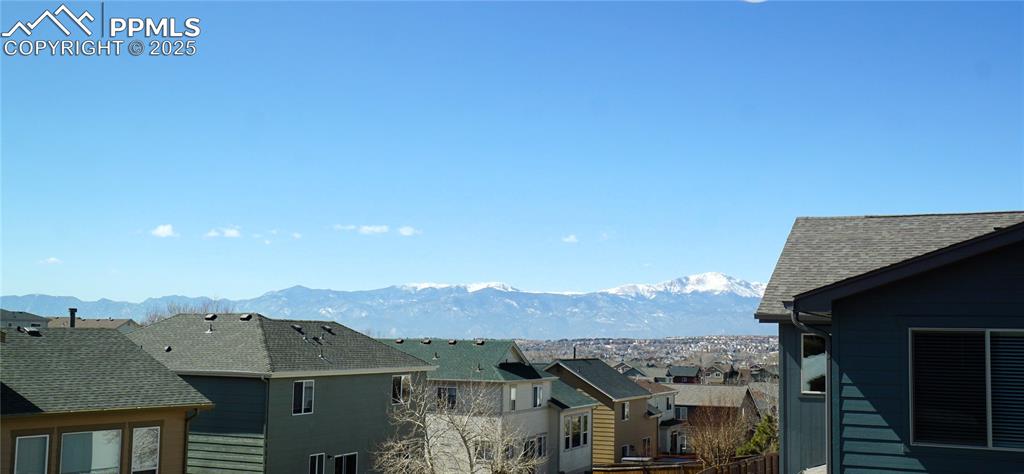 Image 23 of 33: Pike Peak and Rocky Mountain Views from Primary Bedroom