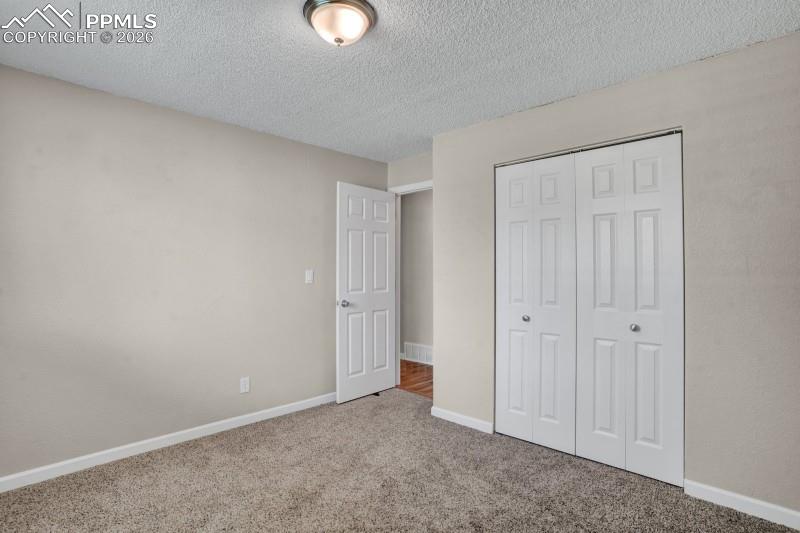 Image 18 of 26: Bedroom