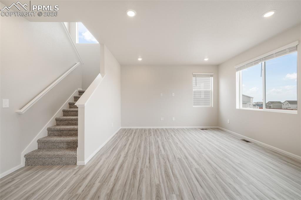 Image 11 of 50: Living Room looking up stairs