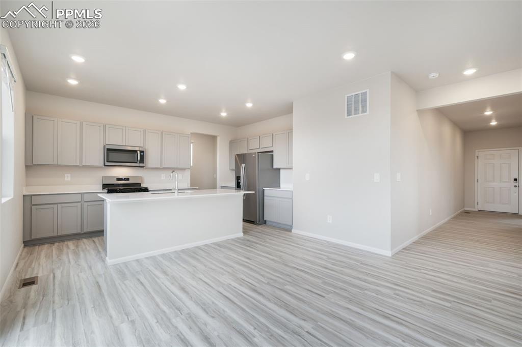 Image 15 of 50: From Living room looking toward kitchern