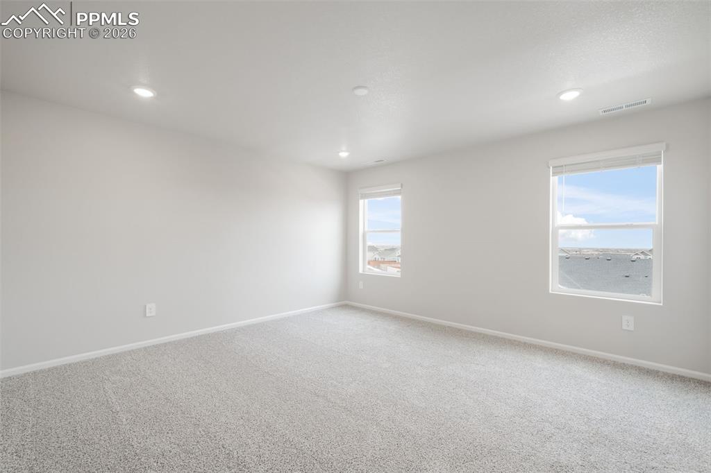 Image 22 of 50: Master Bedroom