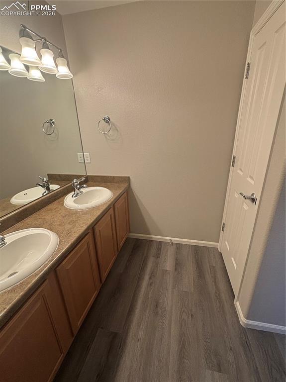 Image 16 of 24: Full upper bath with linen closet