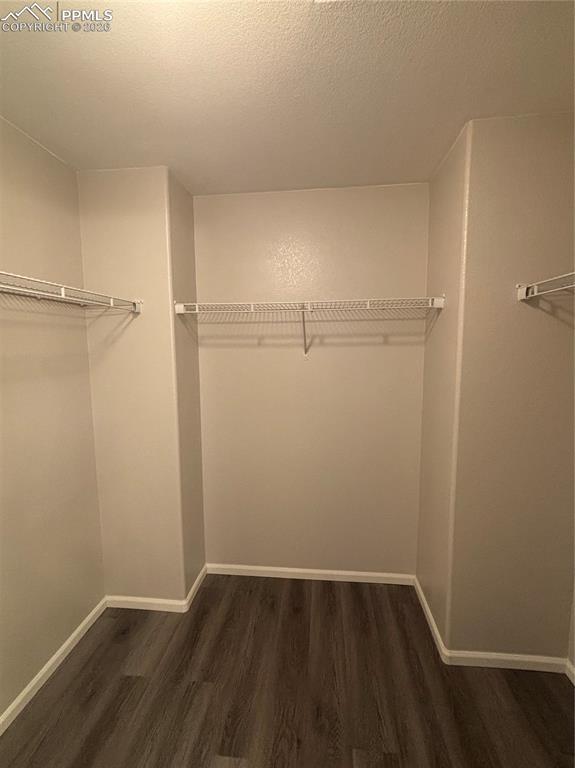 Image 21 of 24: Primary walk in closet