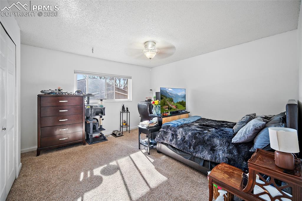 Image 23 of 37: Mian level Bedroom. 