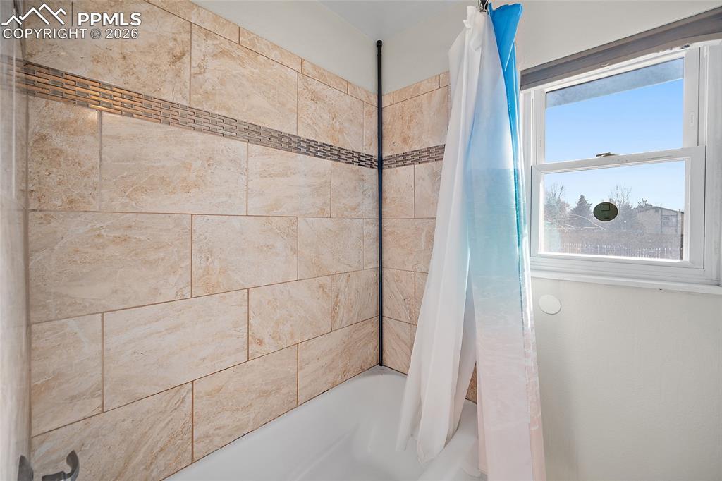 Image 28 of 37: Main level bathroom.  