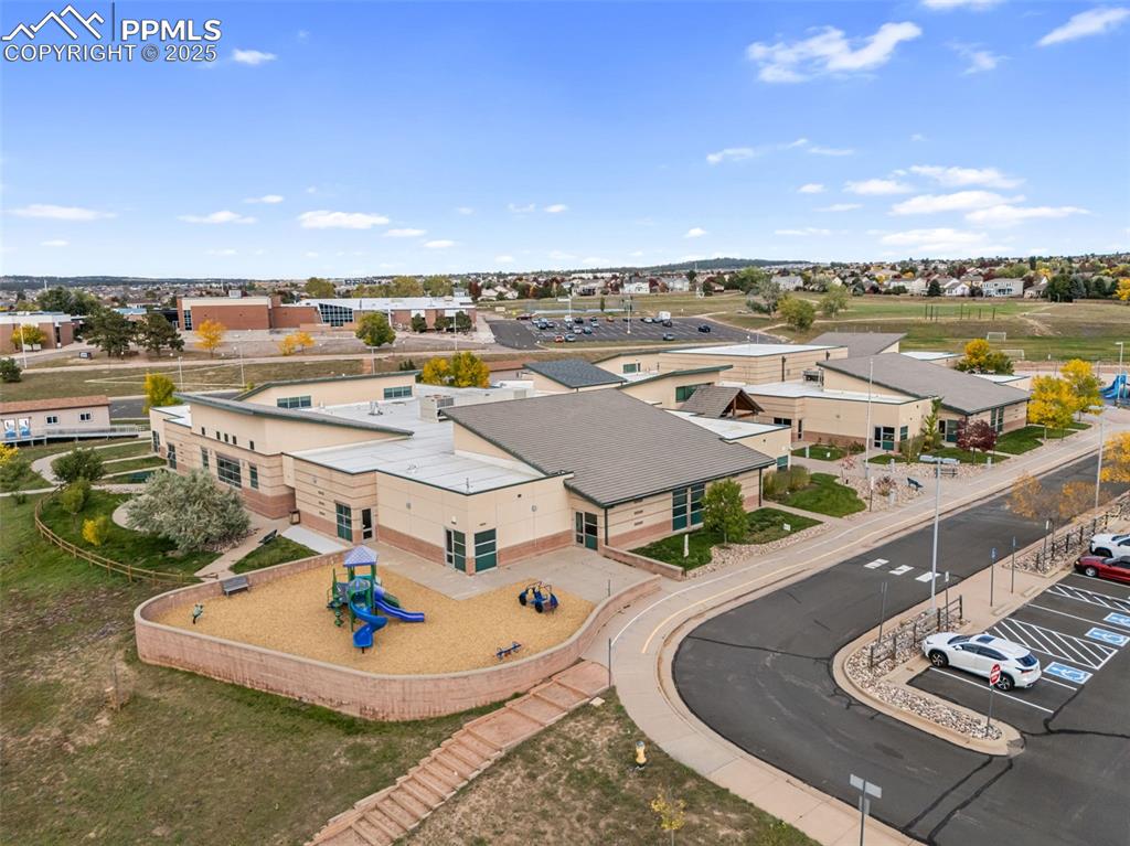 Image 47 of 50: Nearby Mountain View Elementary School and Challenger Middle School ; short