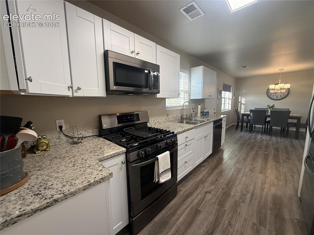 Image 18 of 30: lot of cabinets