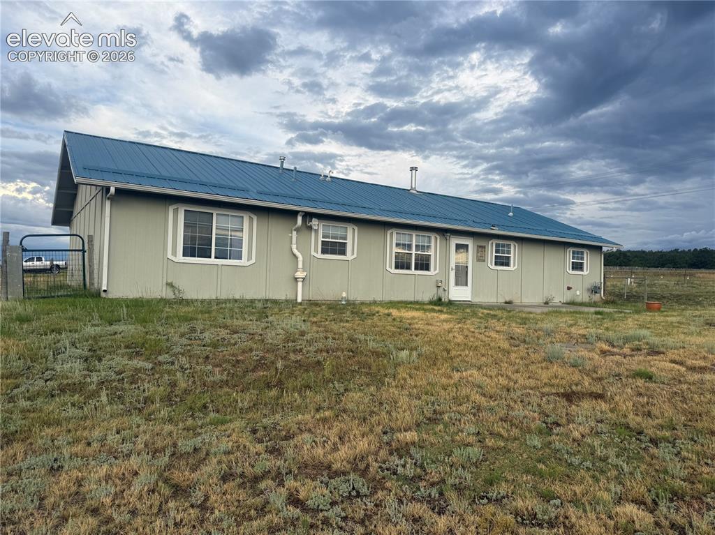 Image 6 of 30: back of house