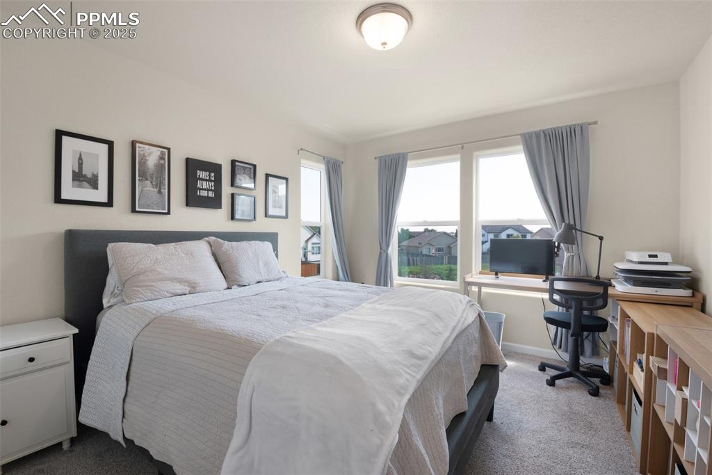 Image 13 of 21: Bedroom