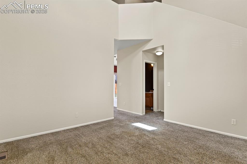 Image 6 of 32: Showing door to half bathroom