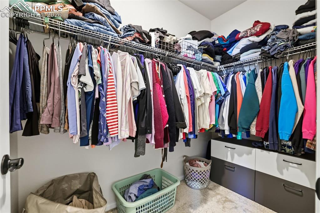 Image 21 of 28: View of walk in closet