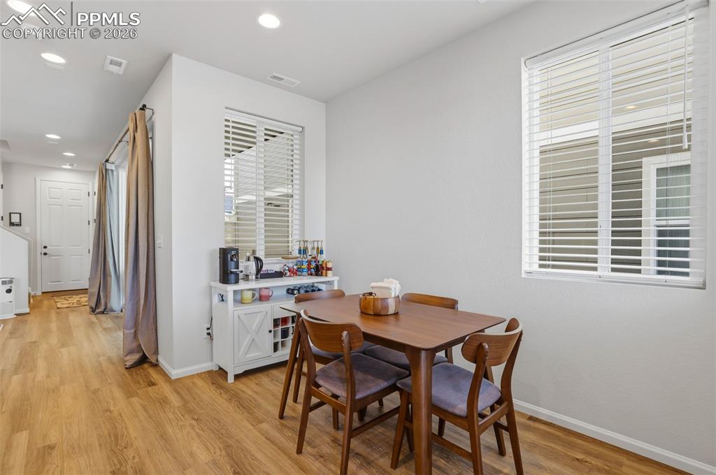 Image 7 of 28: Dining area featuring recessed lighting and light wood-style flooring