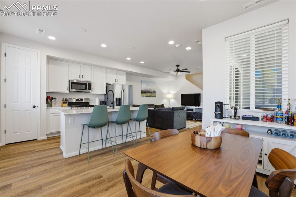 Image 8 of 28: Dining area with recessed lighting, light wood-style flooring, and ceiling 