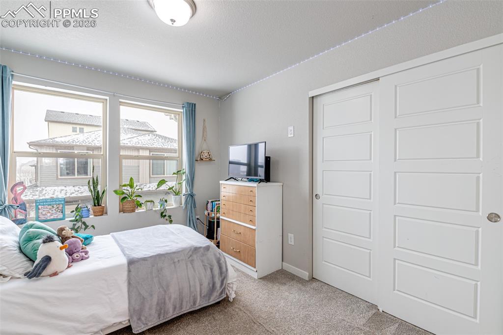 Image 18 of 29: Upstairs bedroom with nice size closet 