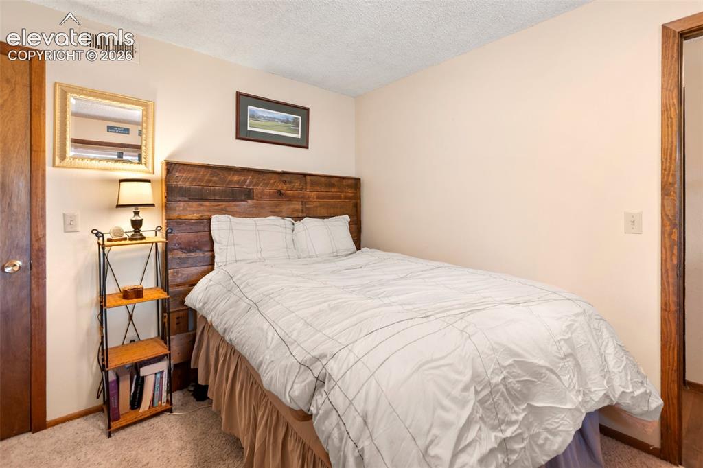 Image 30 of 48: Bedroom