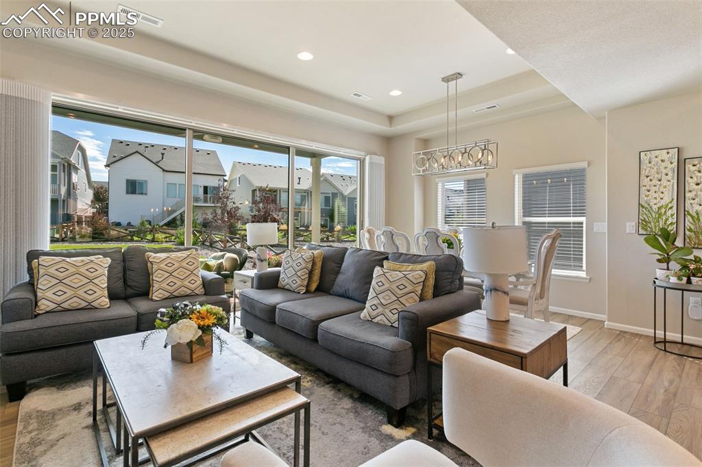 Image 7 of 35: Colorado room sliding glass door lets in natural light and provides access 