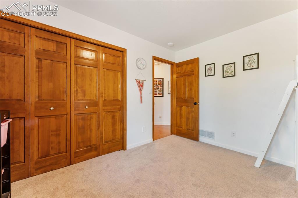 Image 17 of 50: 1st bedroom