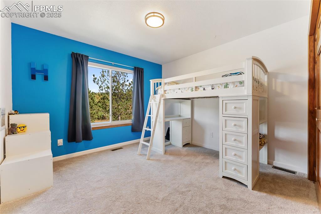 Image 19 of 50: 2nd bedroom