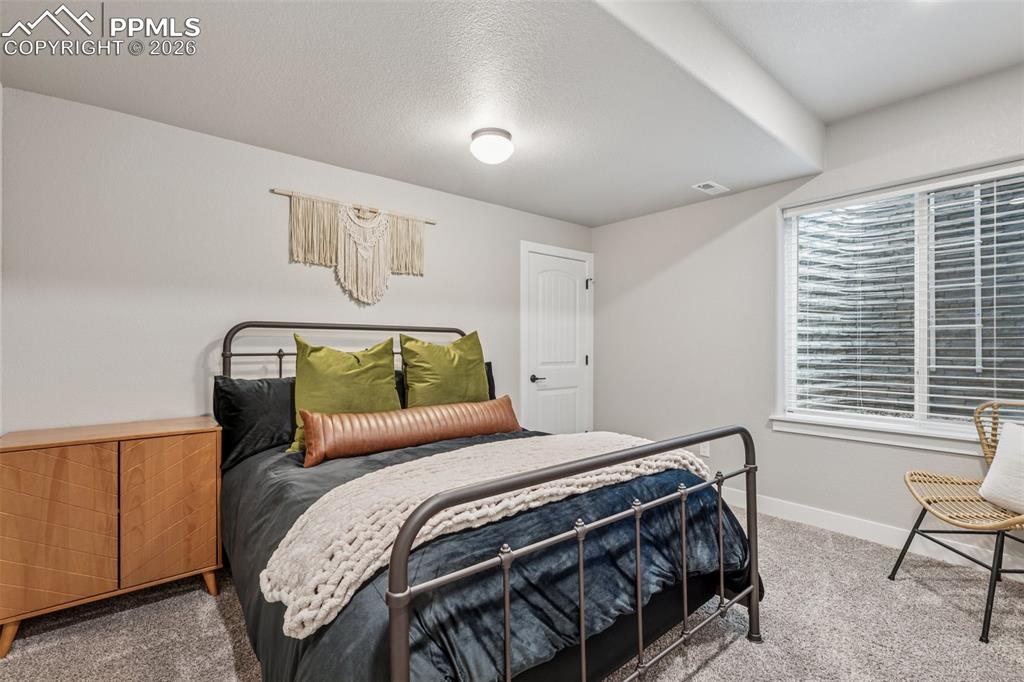 Image 28 of 43: Bedroom