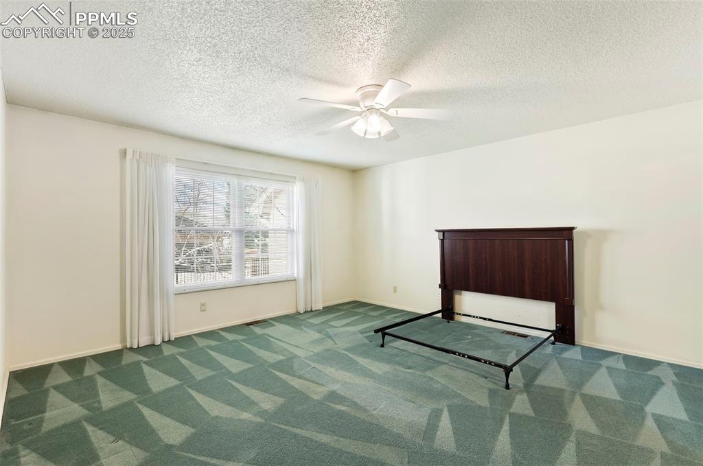 Image 12 of 32: Master Bedroom