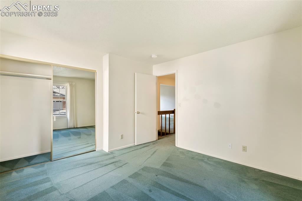 Image 19 of 32: Main level bedroom