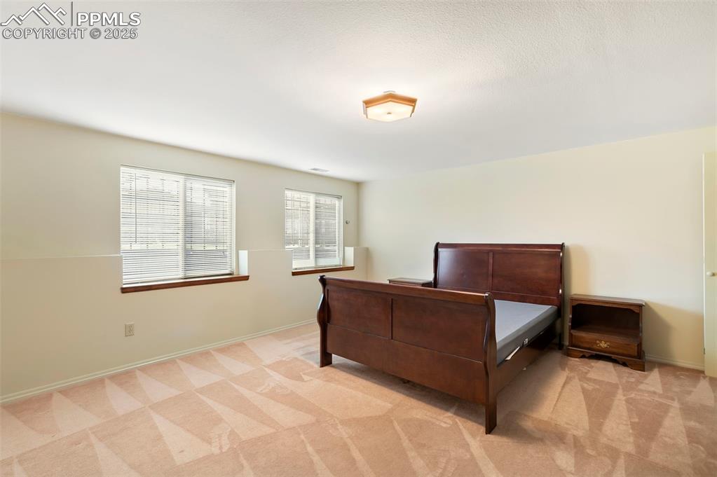 Image 24 of 32: Basement bedroom