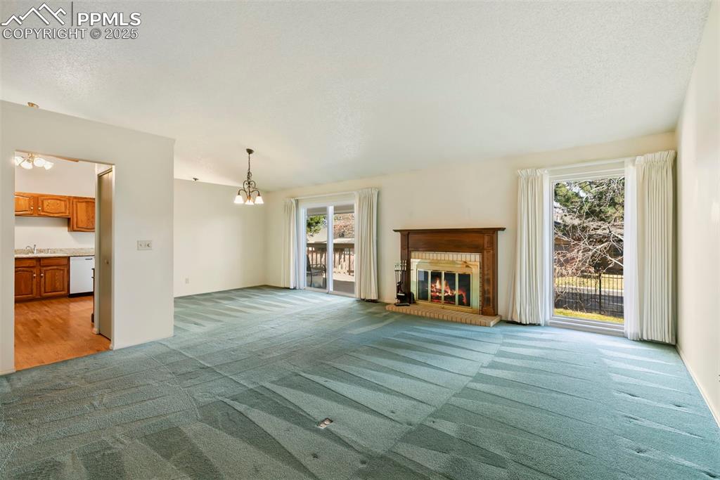 Image 3 of 32: View toward dining room with walk-out