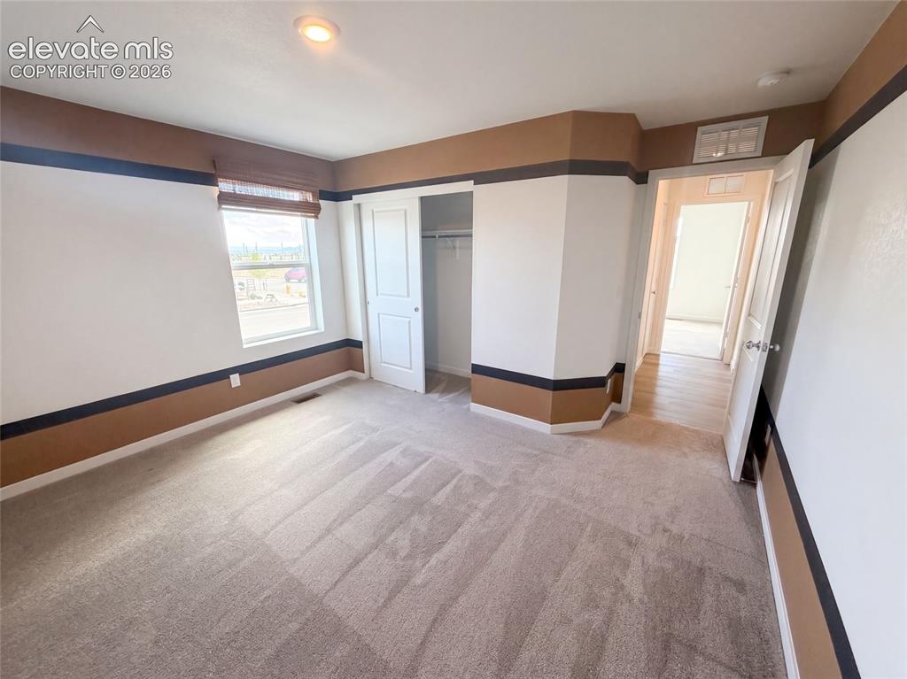 Image 18 of 28: Bedroom
