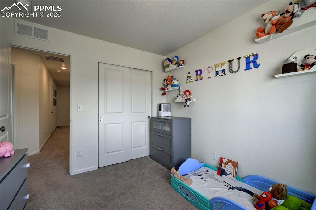 Image 22 of 26: Bedroom