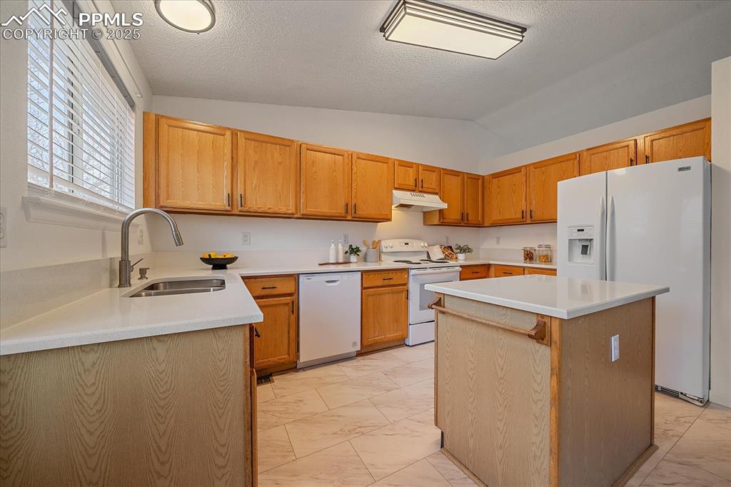 Image 12 of 34: Kitchen With Island, New Granite Countertops
