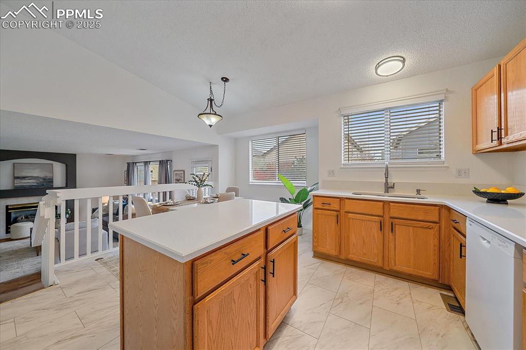 Image 13 of 34: Kitchen With Island, New Granite Countertops