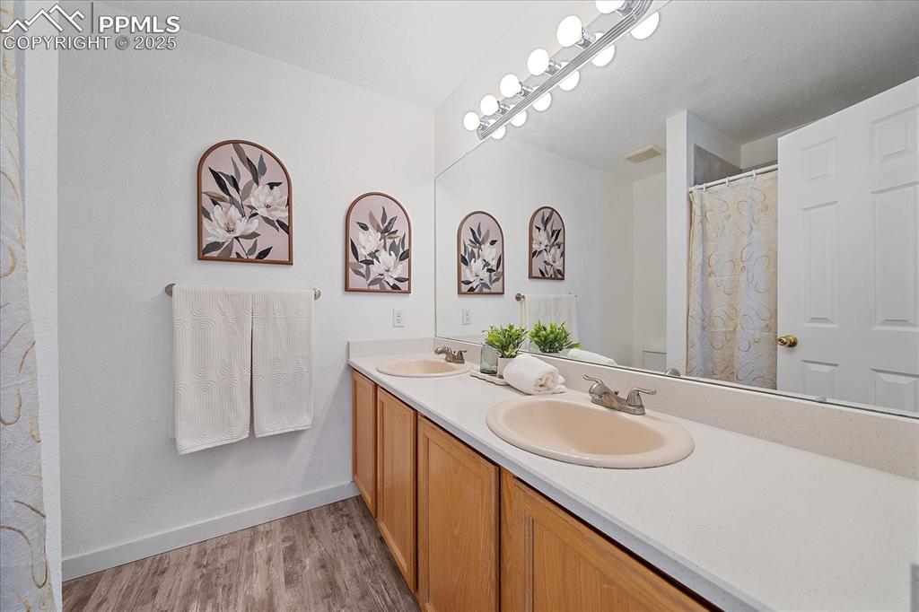 Image 17 of 34: Primary Bath, New Granite Countertop